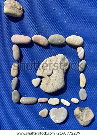Funny pebble figure, Greece, summer-2021