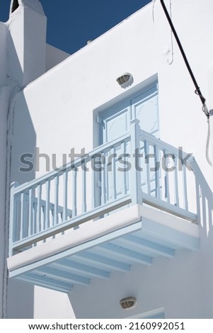 Classic whitewashed buildings line the labyrinthine streets of Mykonos, the largest town on the Greek island of the same name. Matoyianni Street.  capital Hora. traditional Cycladic village bay built 