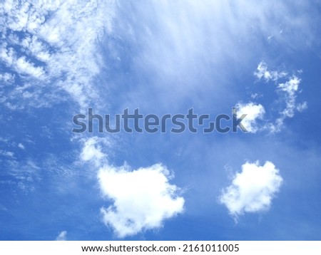 ฺBlue sky with white clouds on a sunny day