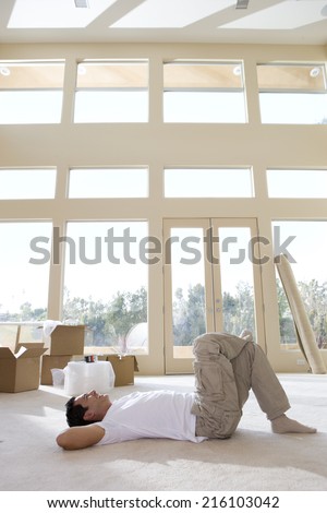 Man relaxing in new home