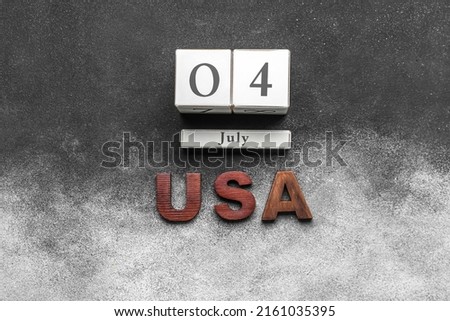 Calendar with date 4 JULY, word USA on black and white background. Independence Day