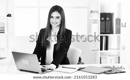 Pretty woman notary at work laptop. Bank worker. Business challenges. Licensed notary. Notaries and notary signing agents manage and witness signatures on official documents. Online banking