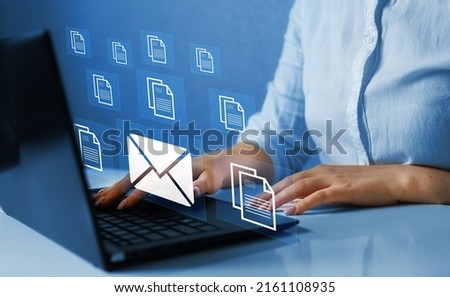 Email marketing, data center and internet advertising. Sending documents digitally using email.  Royalty-Free Stock Photo #2161108935