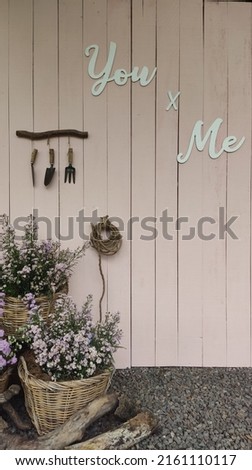 Backdrop photoshoot made of wood with lavender flower and farming tools decoration