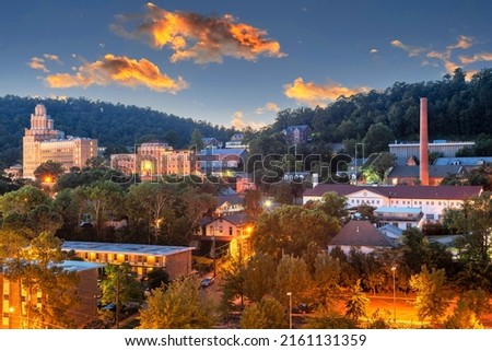Hot Springs, Arkansas, USA townscape at dusk in the mountains. Royalty-Free Stock Photo #2161131359