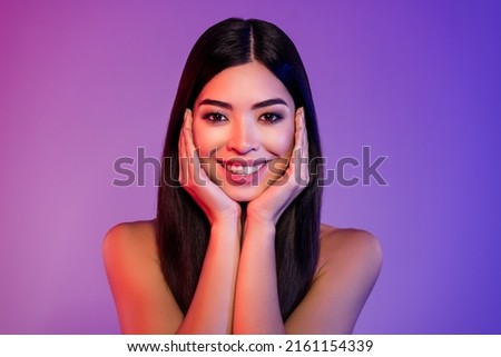 Photo of positive happy young woman touch hands face care detox healthy skin isolated on bright shine background