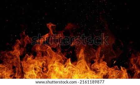 Fire abstract background with flames and copyspace. Isolated on black background. Royalty-Free Stock Photo #2161189877