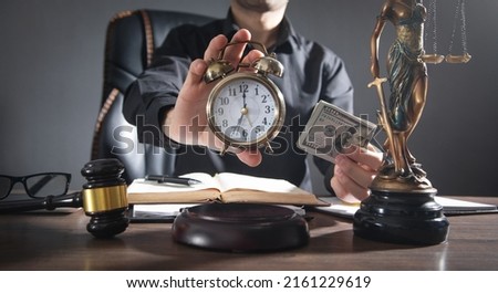 Male judge holding clock and money at courtroom.