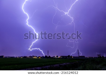 Lightning storm against the city