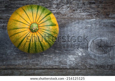 Fresh pumpkin on wooden table, close up