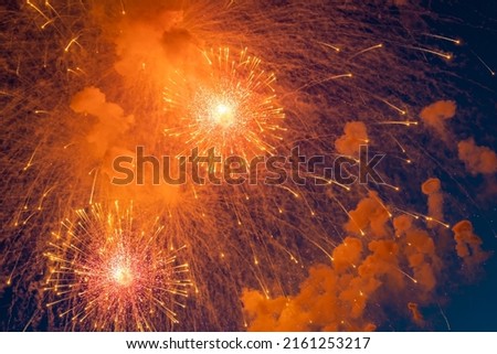 two fiery spheres from the explosion of fireworks on a holiday. background picture.