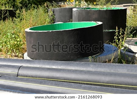 Concrete drain pit block and pipe on construction site