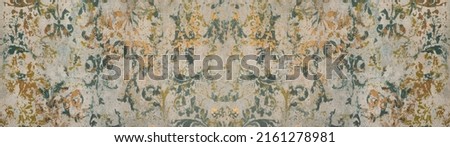 Old green yellow vintage shabby damask patchwork tiles stone concrete cement wall texture background banner panorama Royalty-Free Stock Photo #2161278981