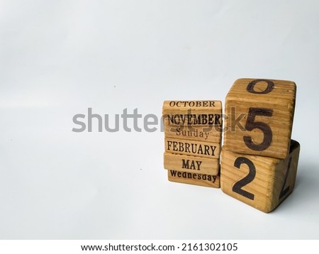 Old handmade wooden cube calendar
