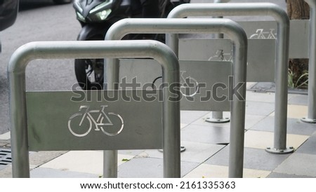 New road signs in Indonesia, bicycle parking lot for park visitors