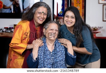 Three generations of women in a picture , Group photo of Grandmother , mother and daughter  Royalty-Free Stock Photo #2161348789
