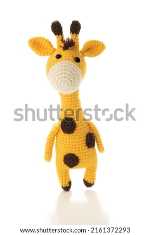 Crochet giraffe isolated on white background