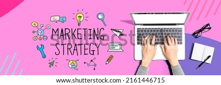 Marketing strategy with person using a laptop computer