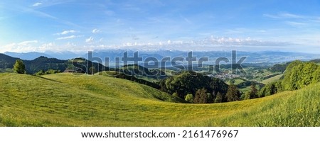 Local recreation area in Zurich Oberland.Beautiful hilly landscape with a lot of wildness with forest flower meadows. Royalty-Free Stock Photo #2161476967
