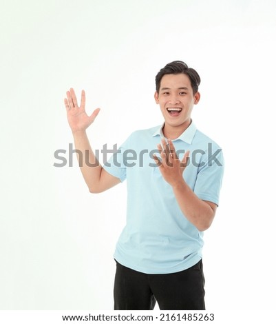 Asian handsome and cheerful young man, isolated on background