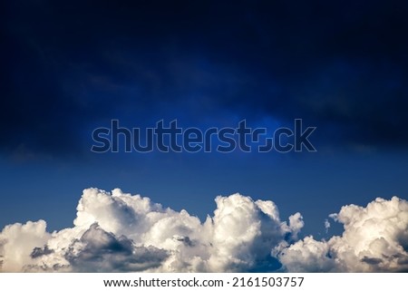 Dramatic Cloudscape Background with a Blue Sky