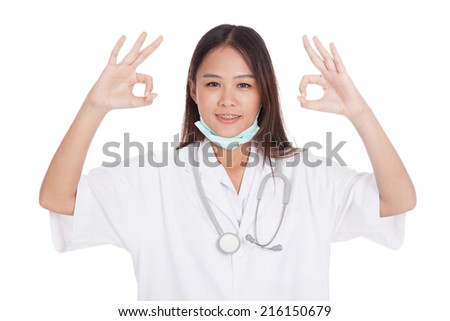 Young Asian female doctor show two OK sign  isolated on white background