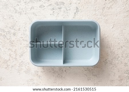 Empty lunch box on light background, workplace food Royalty-Free Stock Photo #2161530515
