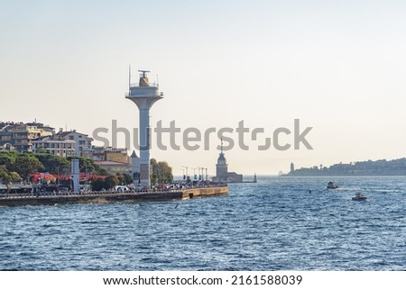 View of the Uskudar Coast Walkway from the Bosporus in Istanbul, Turkey. The Maiden's Tower (Leander's Tower) is visible in background. Istanbul is a popular tourist destination in the world. Royalty-Free Stock Photo #2161588039