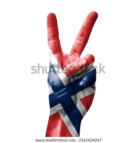 Hand making the V victory sign with flag of norway