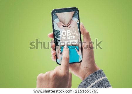 Woman connecting with her smartphone and looking for a job online, POV shot
