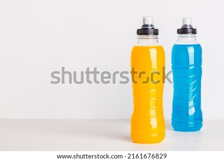 Sport isotonic water in bottle energy mineral hydration balance beverage. Royalty-Free Stock Photo #2161676829