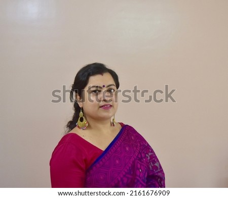 Portrait of a traditionally dressed woman of Indian origin. Indian Woman photo.