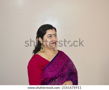 Portrait of a traditionally dressed woman of Indian origin. Indian Woman photo.