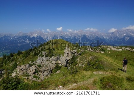 Mountain panorama with blue sky  Royalty-Free Stock Photo #2161701711