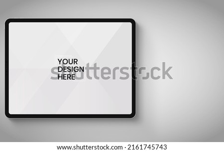 Tablet screen on white background mock up. Tablet modern monitor design. mock up isolated on gray background PSD. Save with clipping path. Royalty-Free Stock Photo #2161745743