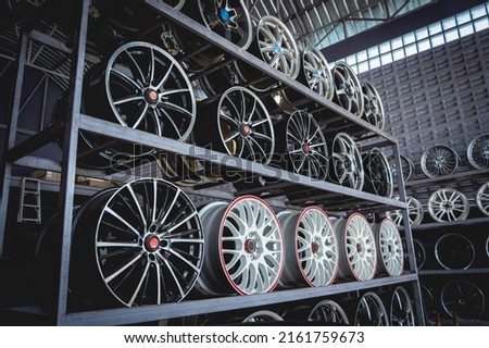 Rows of metal car disks in a shop