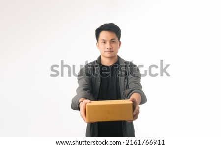 Asian man with parcel boxes on white background