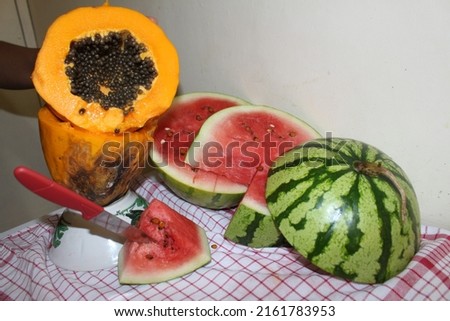 Landscape watermelon and papaya composition pictures on the table, reference pictures for painting