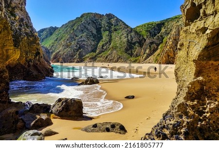 Sea sand beach in the mountains. Mountain sea sandy beach scene. Beautiful sandy beach. Sandy beach landscape Royalty-Free Stock Photo #2161805777