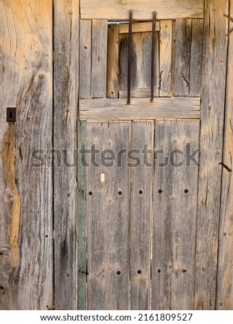 A house with old door in the street, Spain - stock photo