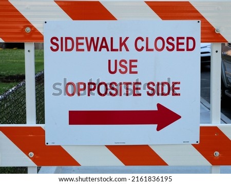 Sidewalk Closed Use Opposite Side of Street Warning Sign