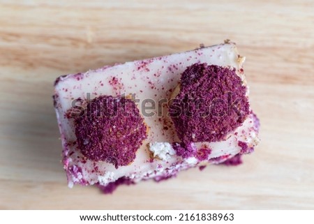red cake cakes with buttercream and cookies in sprinkles, delicious red cake with filling and layers of dairy products