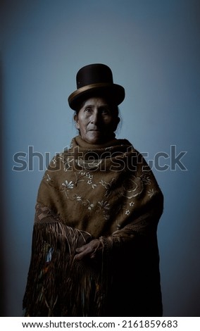 Studio portrait of an elderly woman wearing a chola pace?a traditional costume. Royalty-Free Stock Photo #2161859683