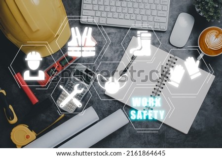 Work safety concept, Top view engineer office with VR screen work safety icon, First secure rules. Health protection, personal security people on job.