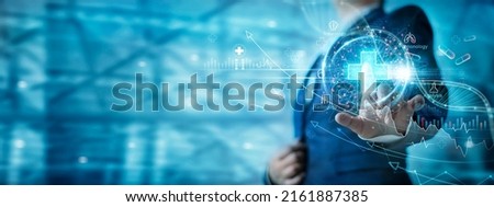 Businessman touch virtual medical network icons. Diseases develop people awareness on healthcare. healthcare business graph growth and medical rising growth in hospital and health insurance business. Royalty-Free Stock Photo #2161887385