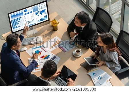 Business data dashboard analysis by ingenious computer software . Investment application display business sales and profit on the computer screen and advise marketing planning decision . Royalty-Free Stock Photo #2161895303