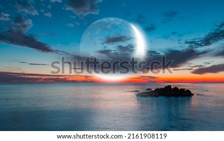 Abstract background with Crescent moon over the sea at sunset Royalty-Free Stock Photo #2161908119