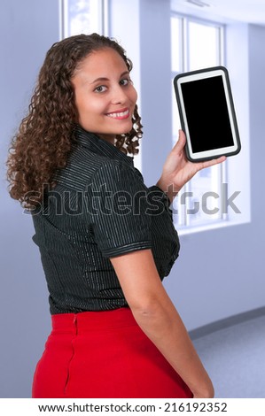 Beautiful technologically savvy woman using a tablet (photo illustration / image composite) 