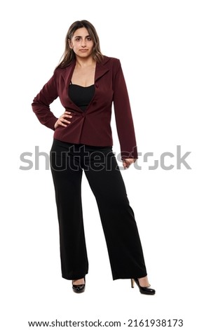 Full length portrait of a young Indian businesswoman in formal office attire, isolated on white background Royalty-Free Stock Photo #2161938173
