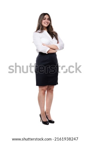 Full length portrait of a young Indian businesswoman in formal office attire, isolated on white background Royalty-Free Stock Photo #2161938247